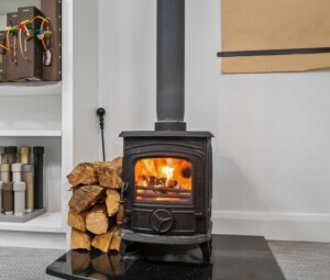 Wood-burning stove in The Design Barn interior fabric library