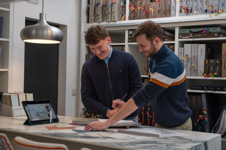 Architectural Spaces team working together in the studio on a project